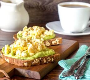 Toasts with Avocado and Scrambled Eggs Photo