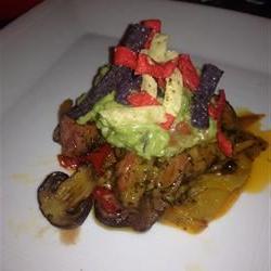 Filet Mignon with Bell Pepper Haystack and Fresh Guacamole Served with Corn Chips Photo